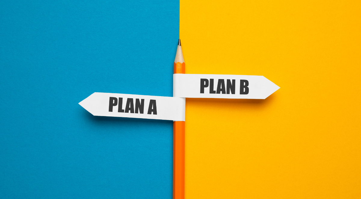 A pencil with two paper tabs that say Plan A and Plan B pointing in different directions
