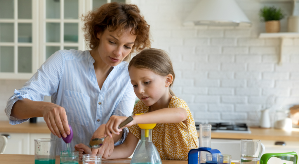 parent and child do a science experiment