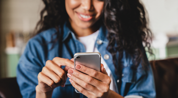 Parent scrolls on their phone